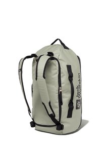 Light green backpack with black accents, featuring a rounded shape, padded straps, logo, and zippered compartments for storage.