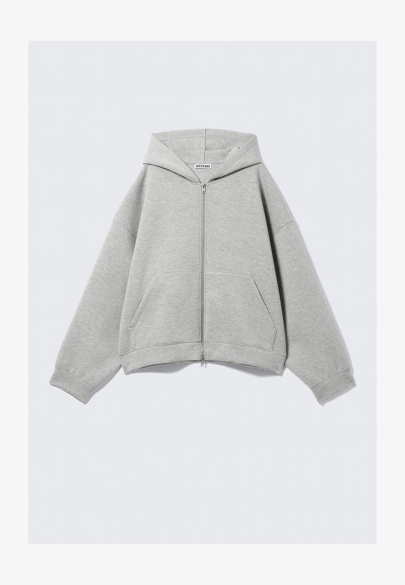 Grauer Reißverschluss-Hoodie aus weichem Baumwollmix, mit Kapuze, Kängurutaschen und gerippten Bündchen. Lockerer, oversized Schnitt.