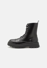 UNISEX - Suvarstomi aulinukai - black