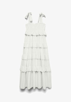 Robe maxi blanche sans manches à volants superposés avec bretelles nouées aux épaules et bords festonnés sur chaque volant.