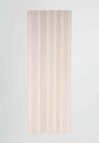 Tissu à motifs présentant des rayures verticales alternées de rose pâle et de crème, avec de subtils motifs circulaires sur un fond texturé.