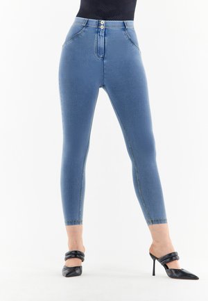 CURVY CON GAMBA - Leggings - denim