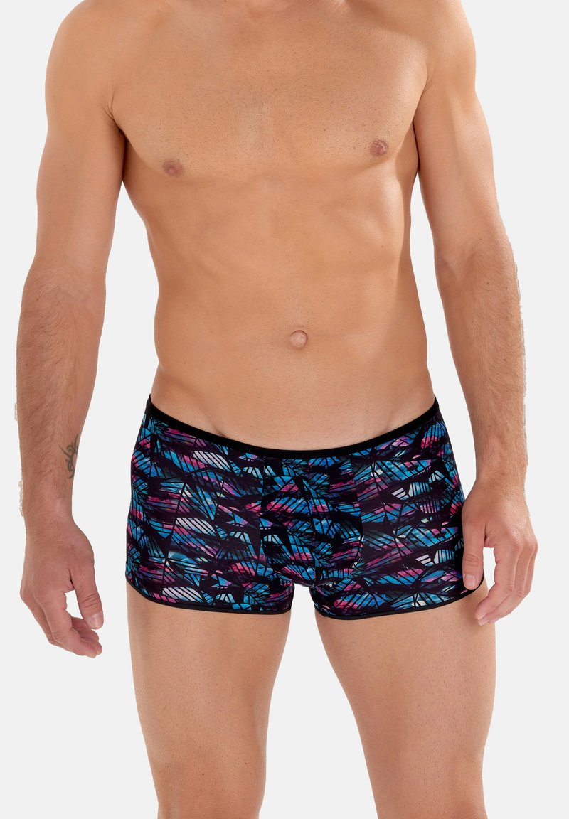Herren-Badehosen mit schwarzem Grund und geometrischem Muster in Blau-, Rosa- und Lila-Tönen. Elastischer Bund für zusätzlichen Komfort.