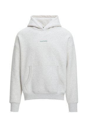 Hoodie vaaleanharmaasta pehmeästä kankaasta, jossa on etutasku. Varustettu kiristettävällä hupulla ja pienellä "CASPARA"-tekstillä rinnassa.