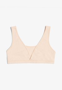 Bralette morbido di un leggero beige con un design frontale triangolare, spalline larghe e una texture liscia. Presenta un semplice elastico alla base.