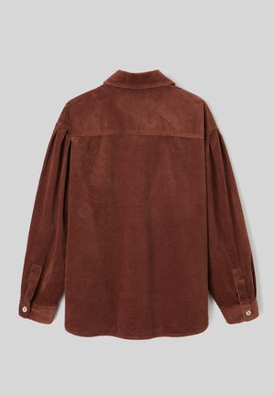 Chemise en velours côtelé marron avec col, manches longues et poignets à boutons. Présente des côtes verticales et un ourlet droit. Vue de dos sans ornements.