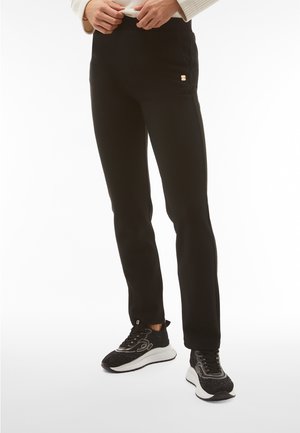 SEAMLESS SPORT - Tracksuit bottoms - nero