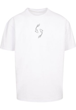 White cotton t-shirt featuring a central black line drawing of two fish. Short sleeves, crew neck, and relaxed fit.