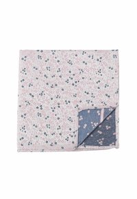 Floral-patterned blanket with a light pink background, featuring navy blue and pink flowers; reversible to a dark blue fabric with lighter accents.