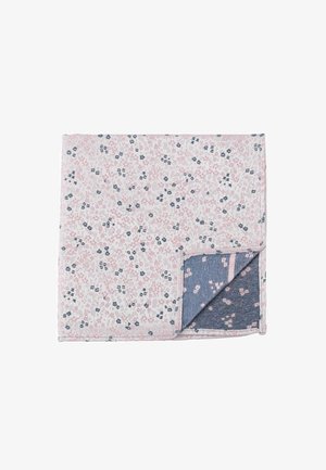 Floral-patterned blanket with a light pink background, featuring navy blue and pink flowers; reversible to a dark blue fabric with lighter accents.