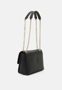 Calvin Klein RE LOCK  CROSSBODY - Taška cez plece - black