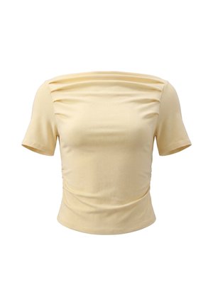 Beige top med korte ærmer, firkantet halsudskæring og rynkede stofdetaljer over bryst og sider.