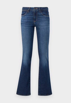Jeans de denim azul mais largos com uma cintura de média altura, design de cinco bolsos e um ligeiro desbotamento. Apresenta detalhes costurados e uma textura suave.