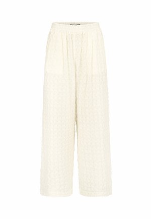 Szerokie kremowe spodnie z elastycznym paskiem w talii i teksturowanym falistym wzorem, z delikatnymi fałdami z przodu i bocznymi kieszeniami.