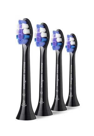 Vier schwarze Philips Sonicare S2 elektrische Zahnbürstenköpfe mit blauen, lila und weißen Borsten stehen in einer Reihe auf weißem Hintergrund.