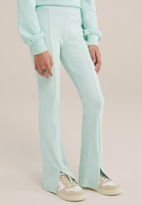 WE Fashion Auduma bikses - green