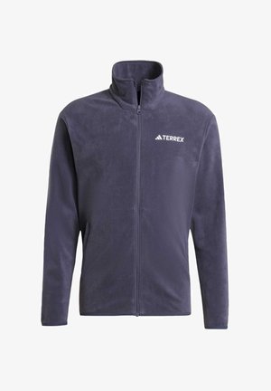 Giacca in pile di un blu navy scuro con colletto alto, chiusura a zip completa e logo TERREX bianco sul lato sinistro del petto. Presenta due tasche laterali.