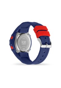 Orologio da polso in silicone blu con accenti rossi, cassa rotonda, retro in acciaio inossidabile, resistente all'acqua fino a 100 m e chiusura in tono argento.