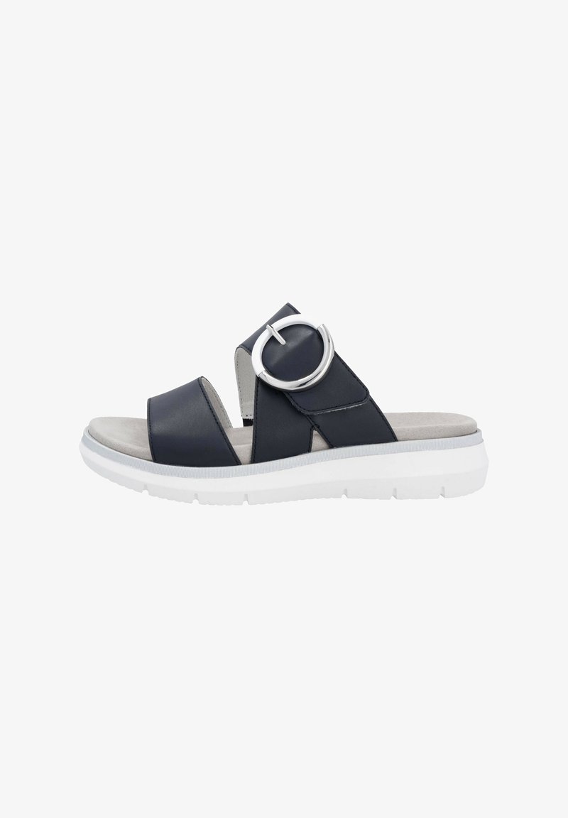 Dark blue leather slide sandal with a circular silver accent, lightweight white sole, open toe, and cushioned footbed.