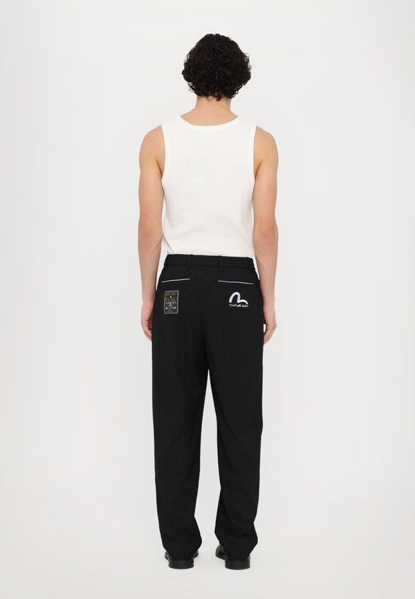 STRIPED TAPER FIT PANTS - Trousers2