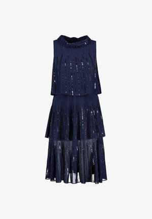 Robe sans manches bleu marine avec des couches superposées et des rayures verticales en sequins noirs, avec un col montant à volants.