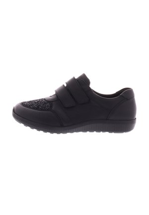 Black athletic shoe with a textured fabric panel, double Velcro straps, soft leather upper, and a rubber sole with a patterned tread.