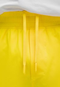 PACE BREAKER LINERLESS 13CM - Sporta šorti - yellow