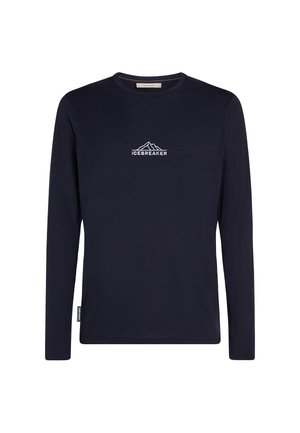Marineblauwe lange mouw shirt van zacht stof, met een bergafbeelding en de tekst "ICEBREAKER" in het wit op de borst. Glad oppervlak, ronde hals.