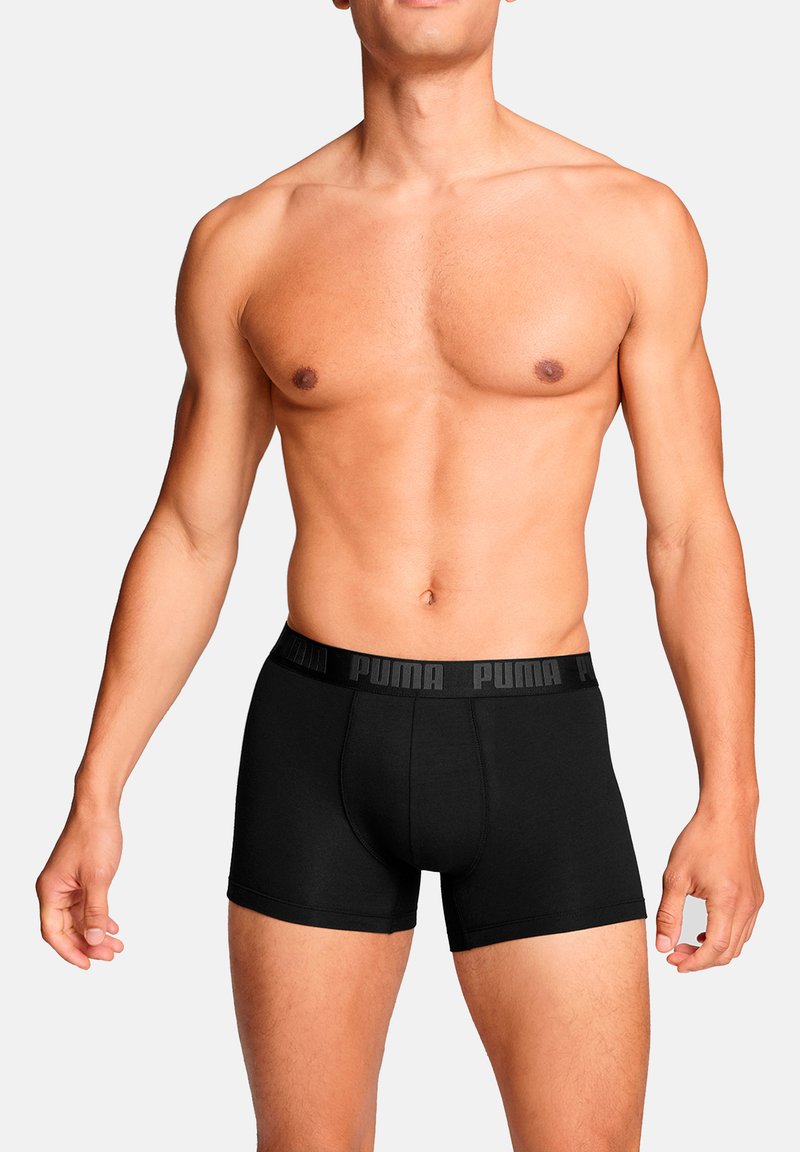 Schwarze Boxerbriefs aus weichem Stoff. Mit einem breiten Bund mit "PUMA"-Logo. Design beinhaltet einen figurbetonten Schnitt und eine glatte Textur.