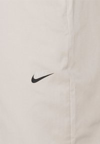 Nike Sportswear Tygbyxor - off-white