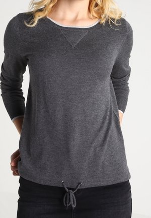 Gray long-sleeve sweatshirt with a drawstring hem, contrasting neckline, and soft texture. Features a relaxed fit.