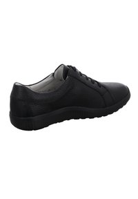 Baskets en cuir noir avec tige texturée, bout rond, design à lacets et semelle en caoutchouc pour une bonne adhérence. La vue de profil met en avant les détails de couture.