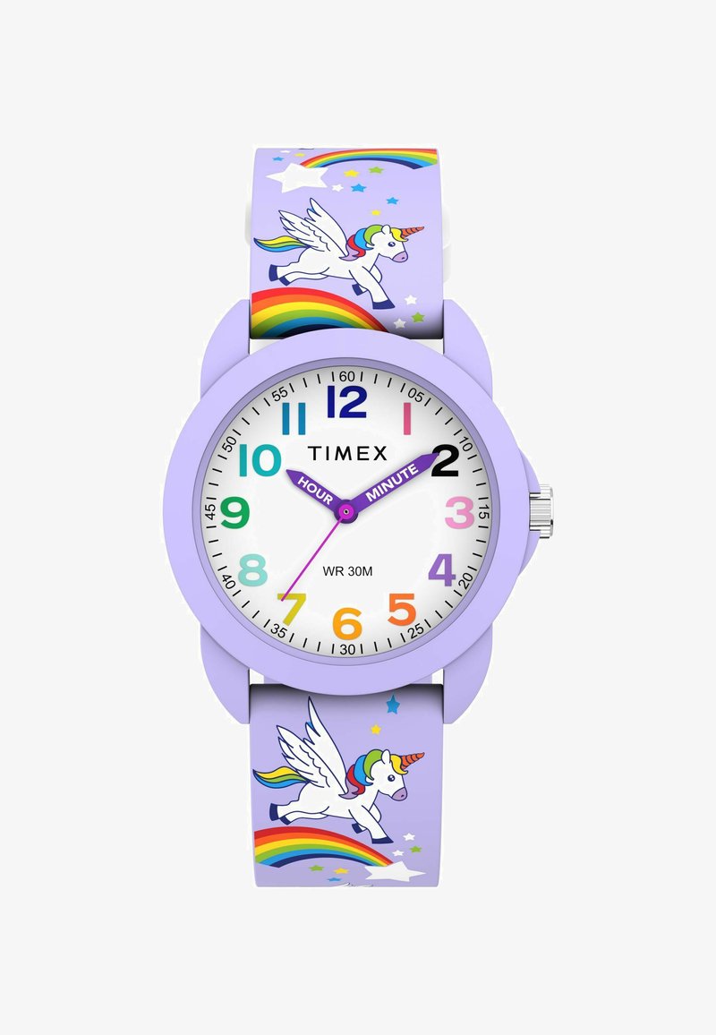 Montre pour enfants de couleur violette avec des chiffres multicolores, des aiguilles des heures et des minutes étiquetées, et un design de licorne et d'arc-en-ciel sur le bracelet.