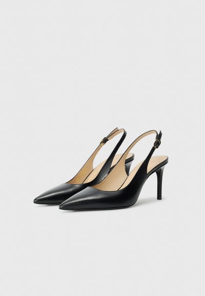 Black leather slingback heels with pointed toes and a slim heel. Features a buckle strap and smooth texture, designed for a sleek appearance.