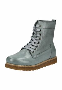 Stivale alla caviglia in pelle grigia con lacci frontali, suola in gomma marrone e zip laterale, progettato per abbigliamento casual o esterno.
