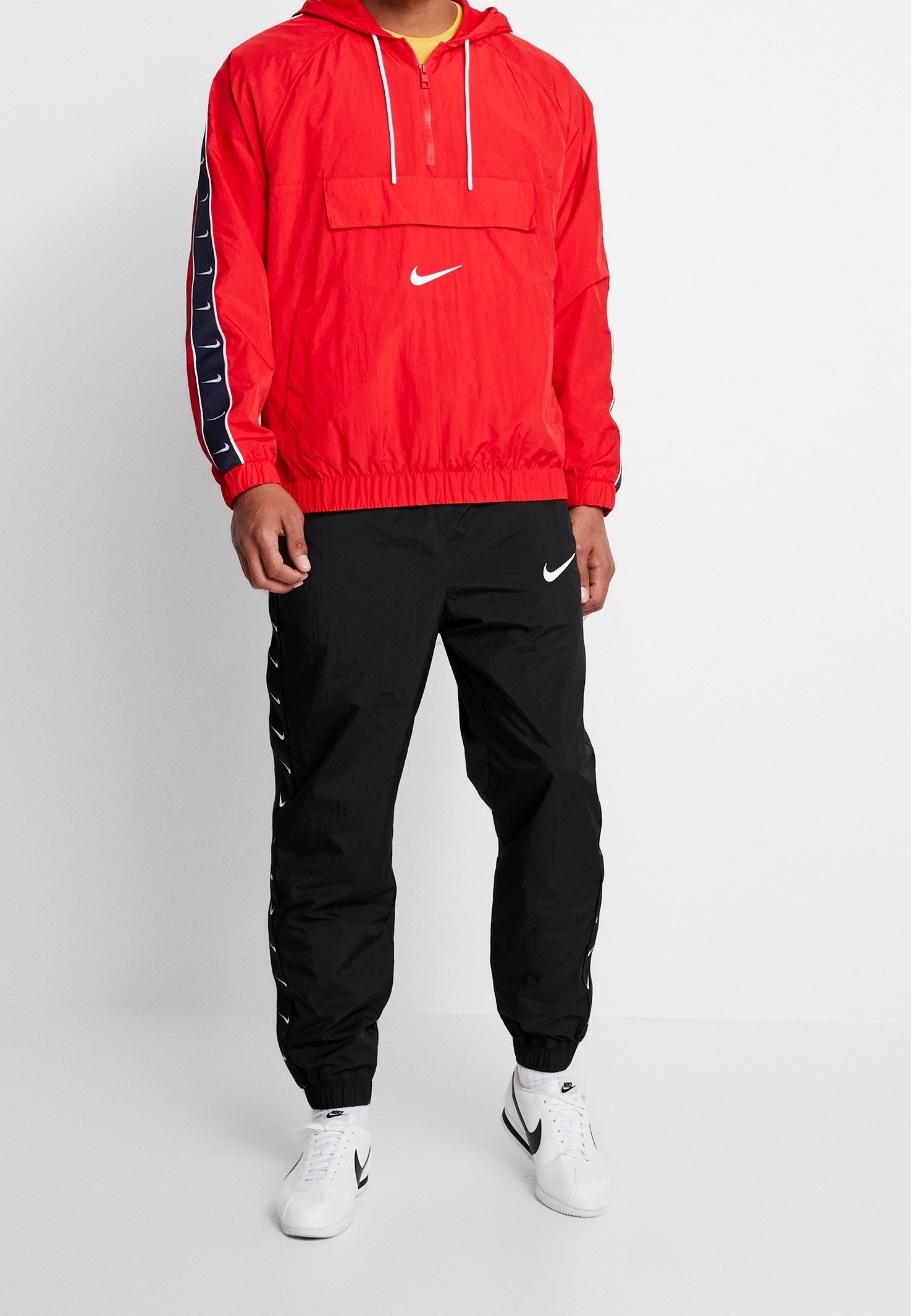 red nike windbreaker pants