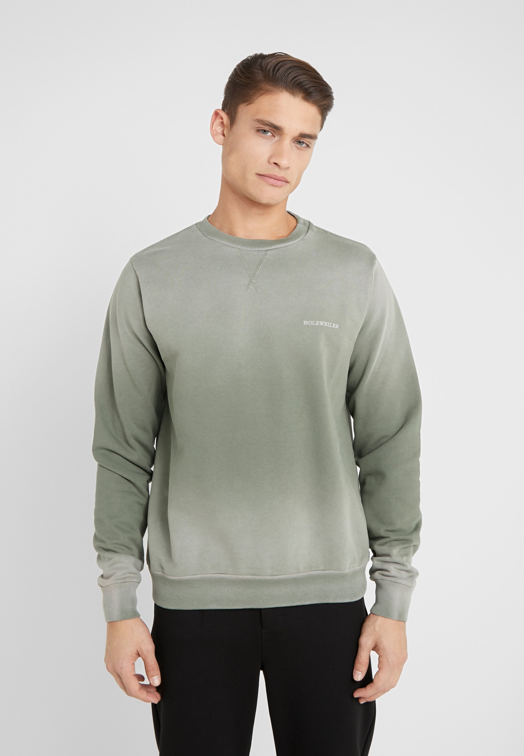 faded green sweatshirt