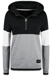 Svart, vit och grå färgblockerad hoodie med dragkedja i halsen, ribbade ärmar och en etikett på nedre vänstra sidan. Mjuk tygkvalitet.