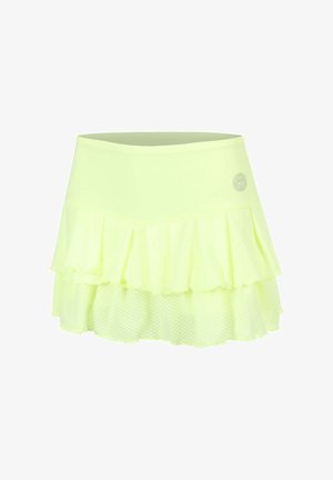 Gonna da tennis gialla a vita alta con strati e fondo in tulle ruché, con piccolo logo circolare sul lato destro della cintura.