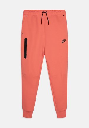 Nike-Sweatpants in leuchtendem Korall, mit einem Kordelzugbund, einem Reißverschlusstasche an der Seite und schwarzen Akzenten, einschließlich des Logos.