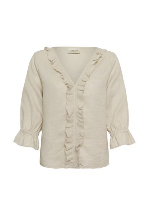 Cremefarbene Bluse mit dreiviertellangen Ärmeln, gerafftem V-Ausschnitt vorne und elastischen Rüschenbündchen.