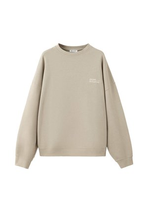 Sudadera de cuello redondo en beige claro con mangas largas y pequeño texto blanco en el pecho izquierdo que dice "ESCAPE Do it your way".