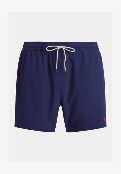 Calções de banho azul-marinho com cintura elástica e cordão branco; apresentam um pequeno detalhe de logótipo vermelho na parte inferior.