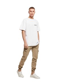 Merchcode UNFOLLOW FRONT  OVERSIZE  - T-shirts med print - white