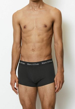 Black boxer briefs made of a soft fabric, featuring a logoed elastic waistband. The design is form-fitting with a smooth texture.