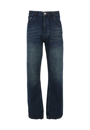 Tmavomodré riflové nohavice s vysokým pásom, širokými nohavicami a mierne rozstrapkaným lemom. Majú kontrastné švy a zapínanie na predný gombík.