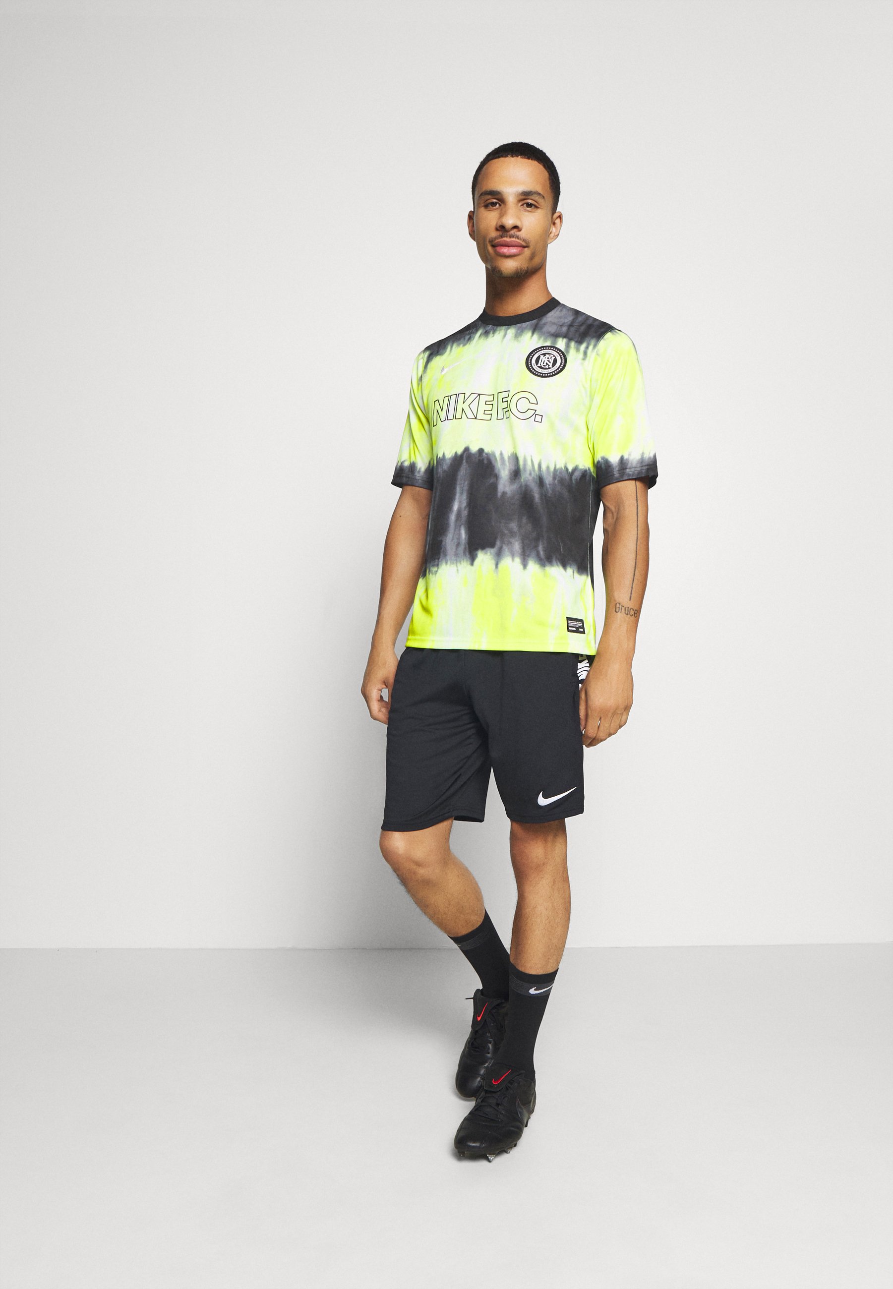 Nike Performance FC - Print T-shirt - black/volt/white/black - Zalando.co.uk