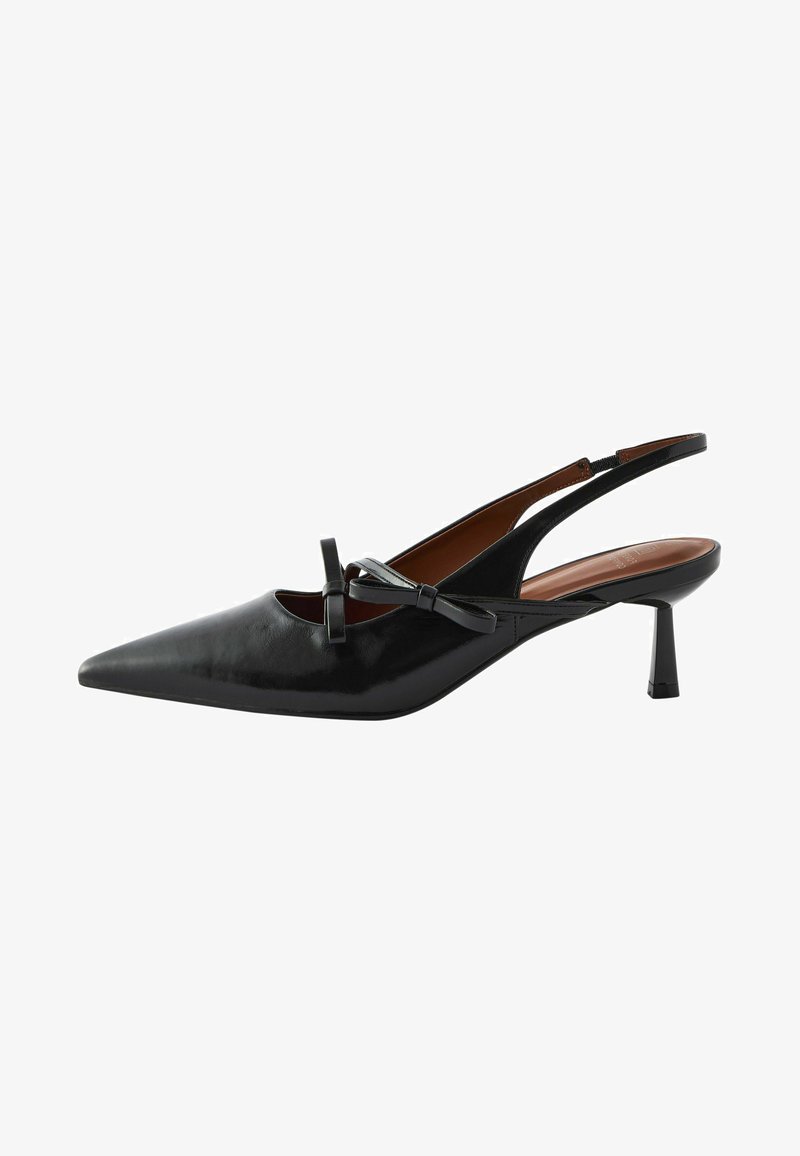 Black leather slingback heels with a pointed toe, small bow detail, and a tapered heel. Smooth texture and minimalistic design.