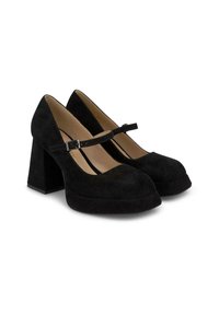 Décolleté Mary Jane in suede nera con punta arrotondata, tacco a blocco spesso e cinturino alla caviglia con fibbia argentata. Fodera interna liscia.