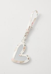 Heart-shaped mirror keychain with a glossy white border and floral pattern; includes a strap for attachment. Mirror is central and reflective.